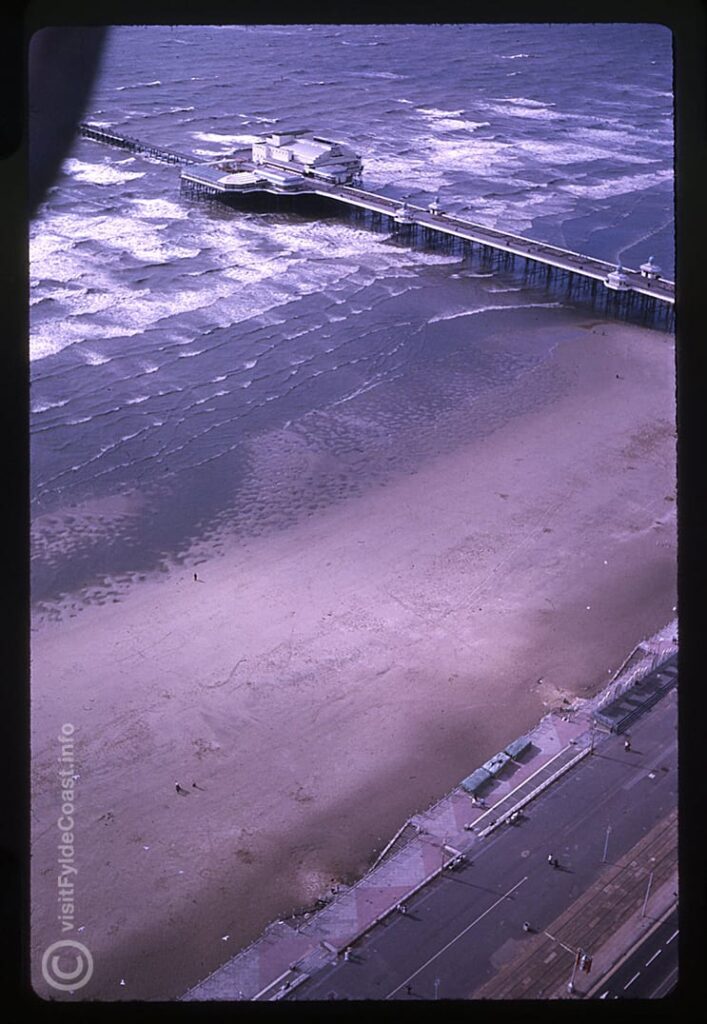 Aerial view of the beach and North Pier from the top of the Tower. 1980's