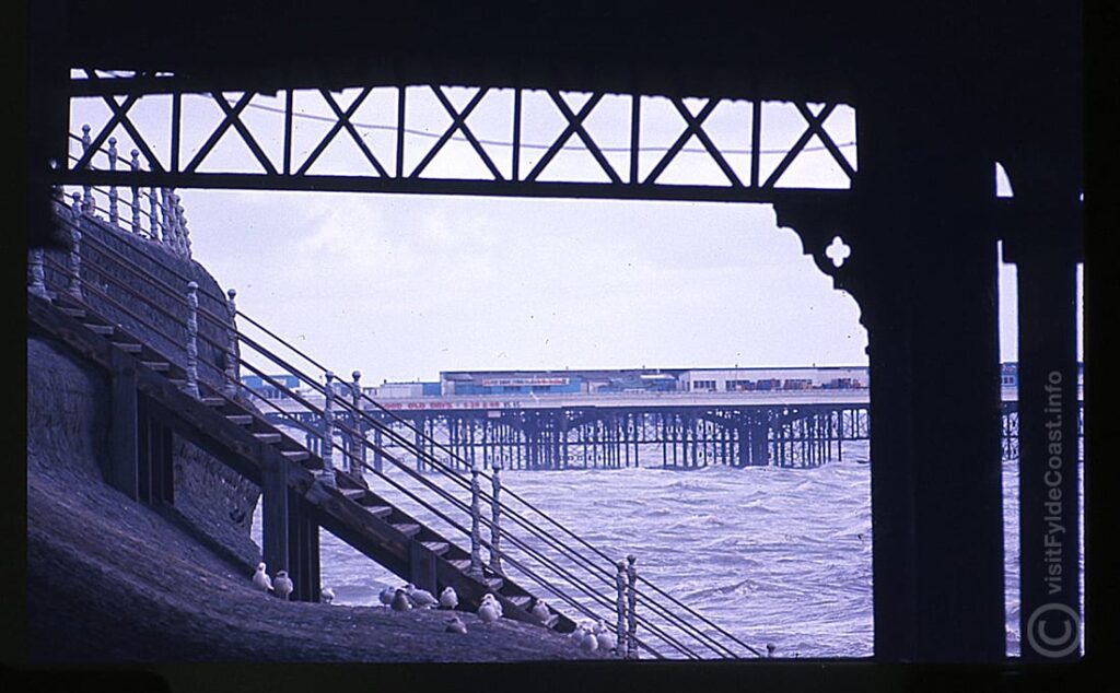 Old photo of Blackpool seawall, taken under North Pier