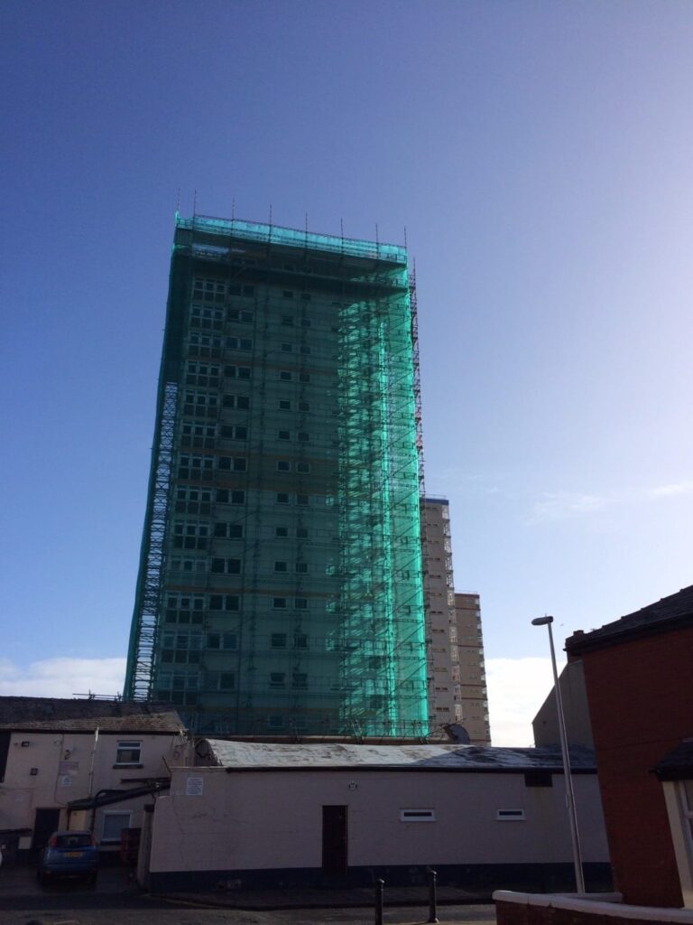 One of the Queens Park flats tower blocks being demolished bit by bit in 2014. Photo by Visit Fylde Coast, taken April 2014