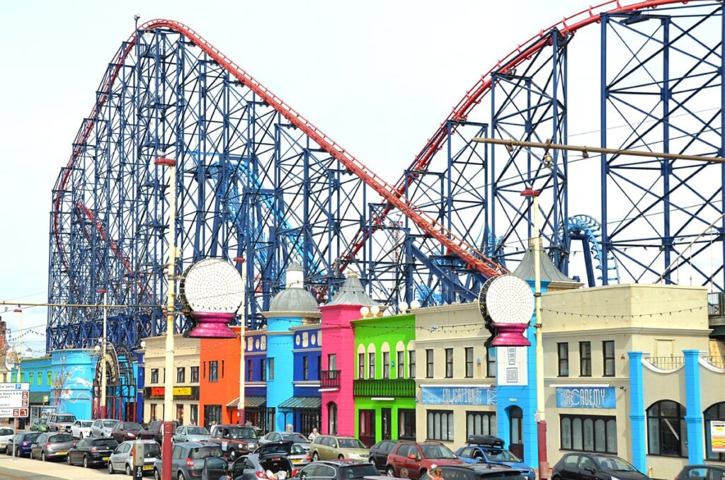 Shops that line the edge of the promenade, against the Pleasure Beach