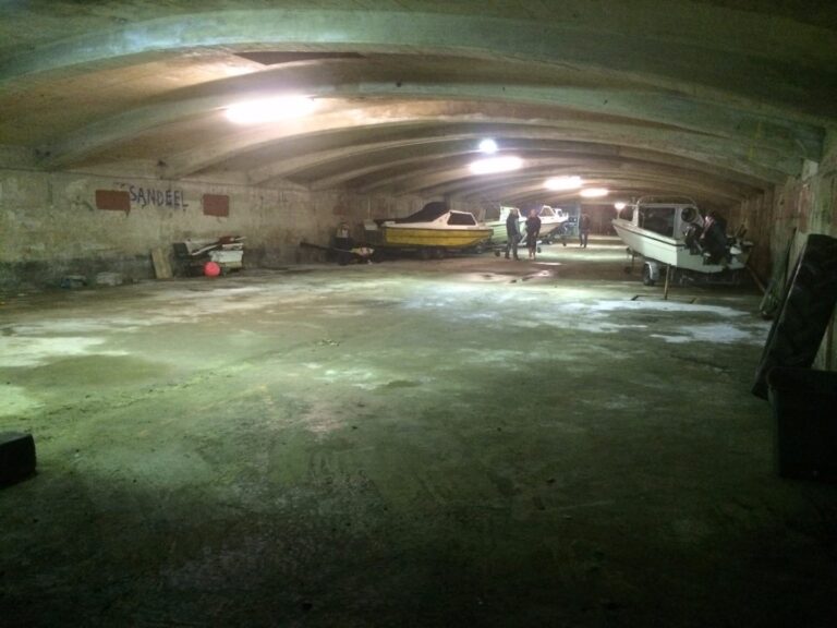 Stored angling boats in the underground boat store at Little Bispham