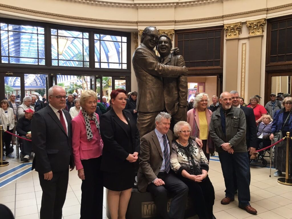 Family of Morecambe and Wise with local dignitaries and sculptor Graham Ibbeson. Photo: Visit Fylde Coast