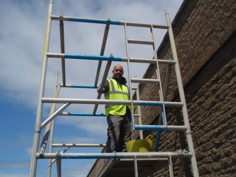 Paul pointing the wall at Anchorsholme