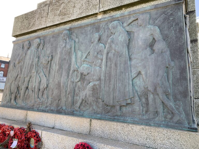 Sculptures of the women and children on the bronze