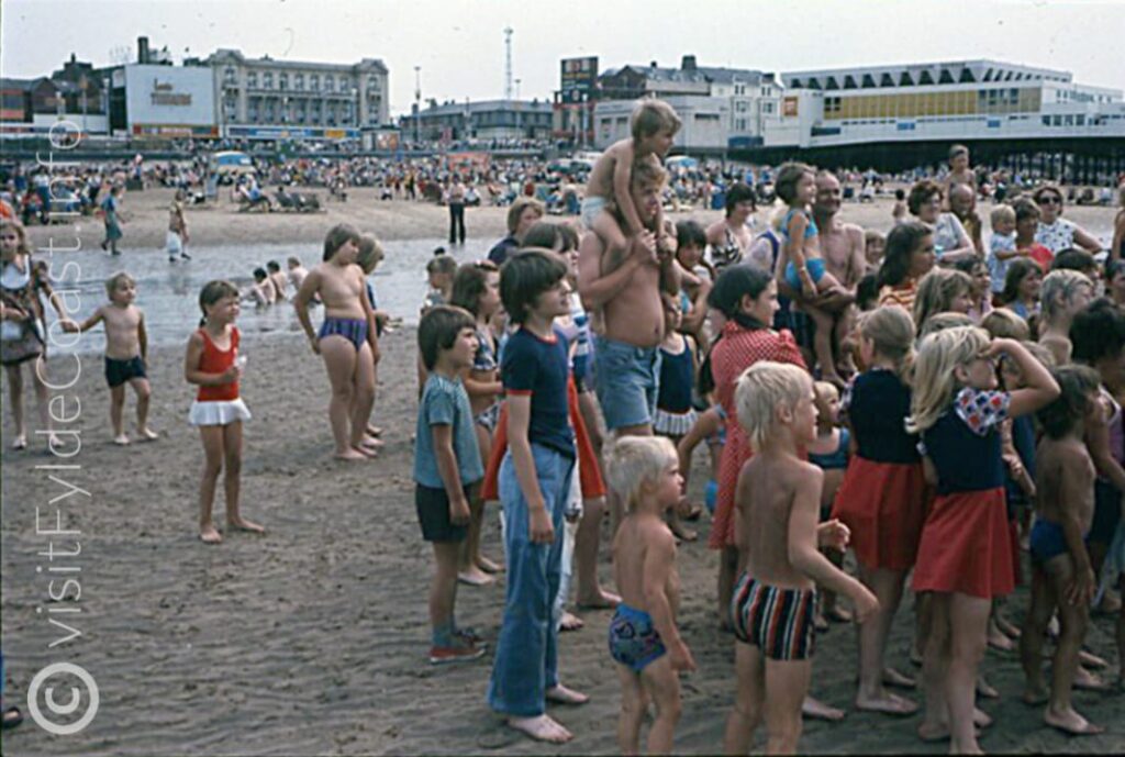 Watching Punch and Judy on Blackpool beach