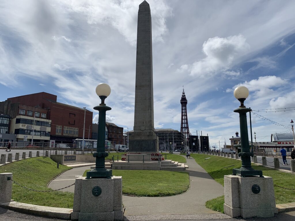 Blackpool War Memorial, with the Blackpool Tower in the distance