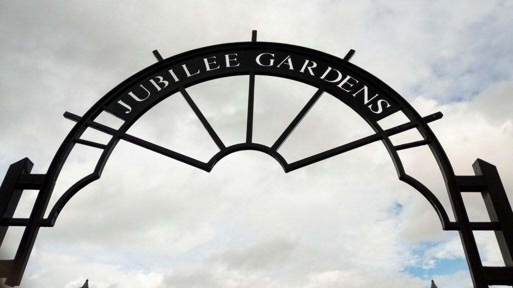 Entrance archway at Jubilee gardens, cleaned and repainted