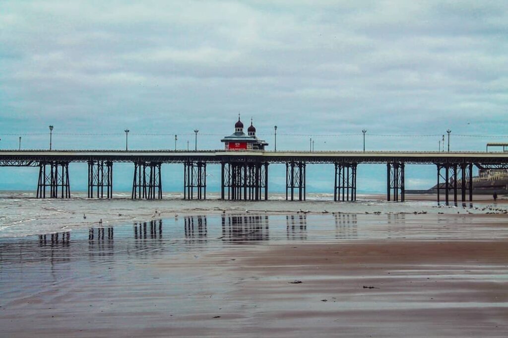 North Pier and Blackpool beach in April by Elina Zvigure