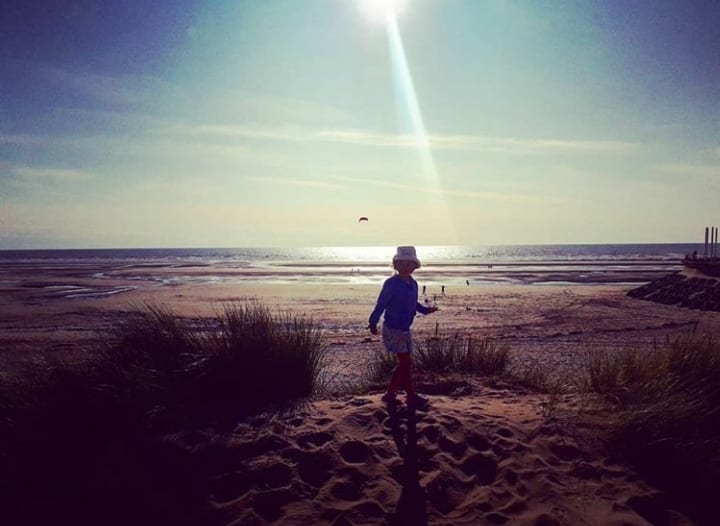 Evie in the sand dunes at Squires Gate by Craig Birtwistle