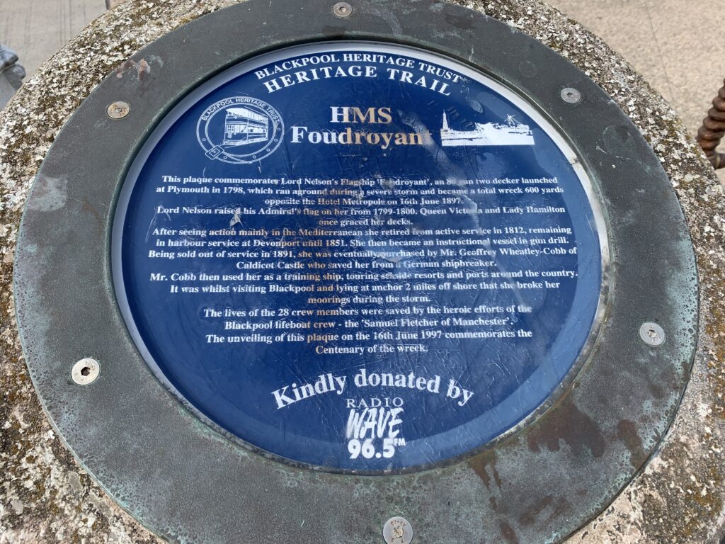 Detail of the Blue plaque to HMS Foudroyant, against North Pier in Blackpool