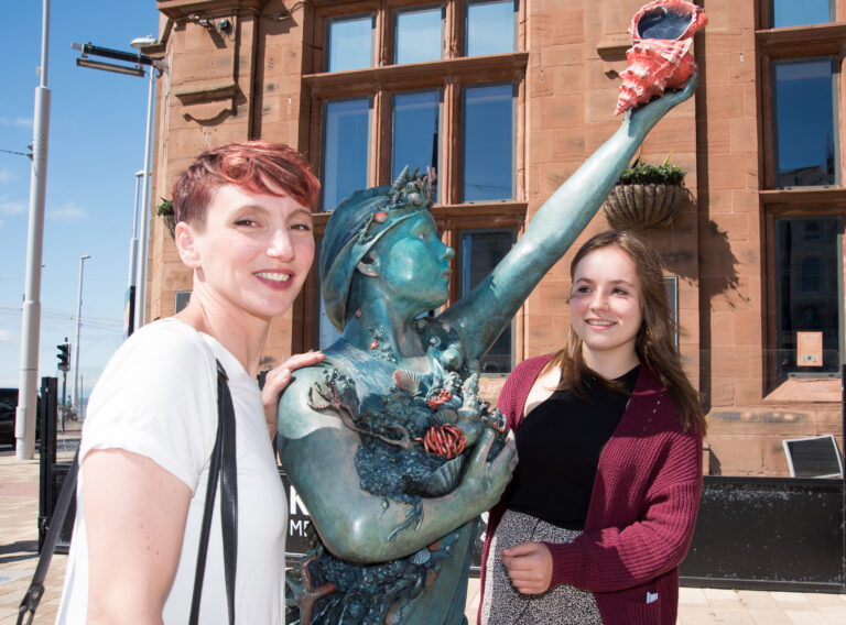 Laurence and Charlotte with the statue at Talbot Square
