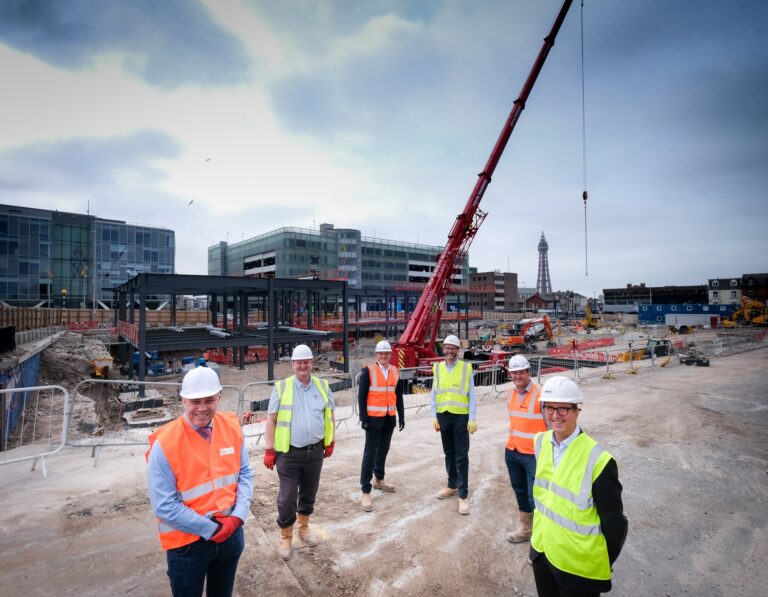 Marking installation of the steel frame for the Holiday Inn