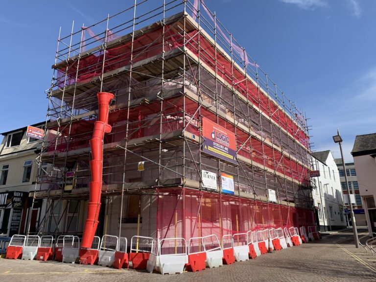 Cedar Tavern shrouded in scaffolding in March 2021