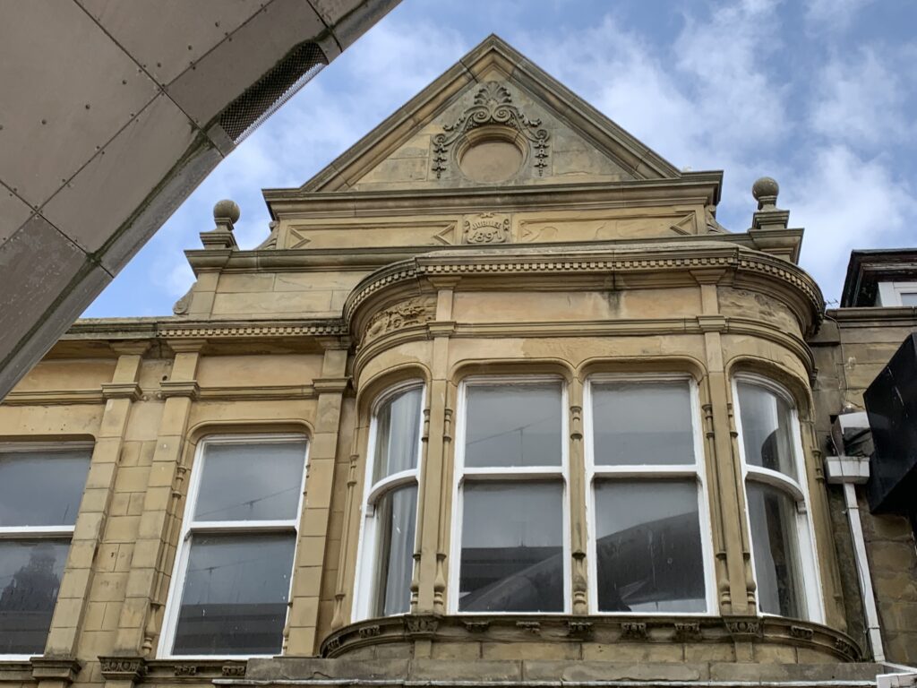 Ornamental date plaque on a building at Birley Street