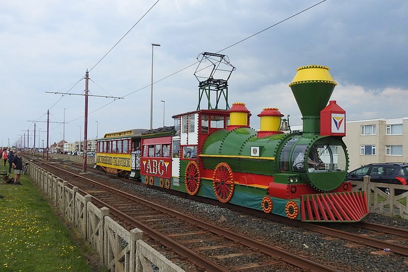 Away from the crowds on dedicated track the illuminated American ‘ABC’ locomotive and carriage exhibits a fair turn of speed, returning from Little Bispham.