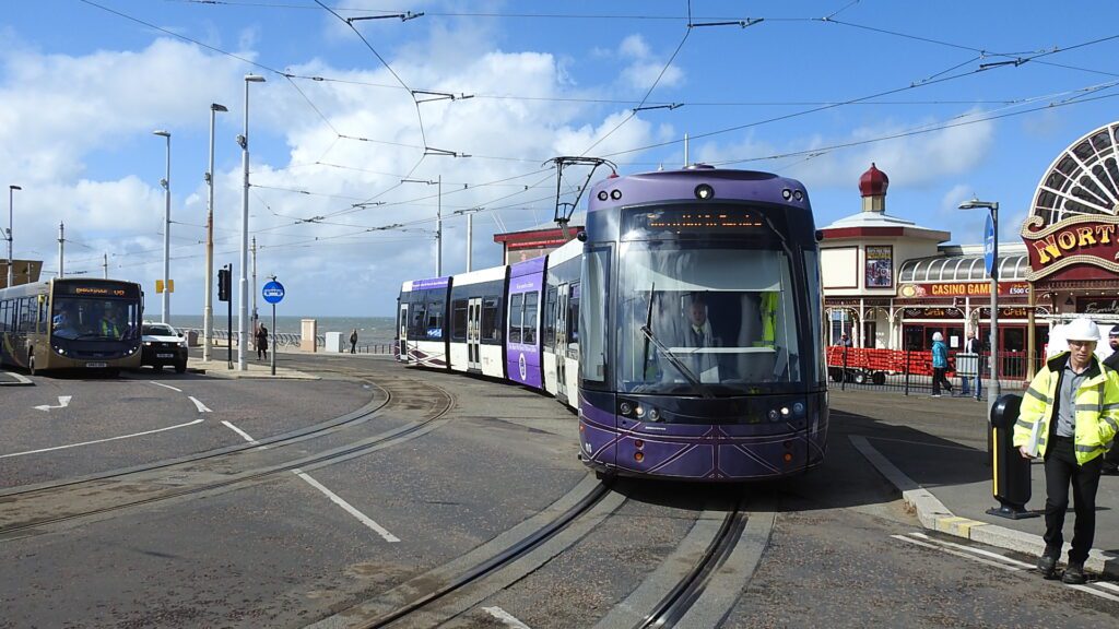 Having been held in the North Pier loop for some time, Flexity2 No.010 makes it first tentative move on to the new tracks using the curve from the northbound promenade track. Photo: Barrie C Woods