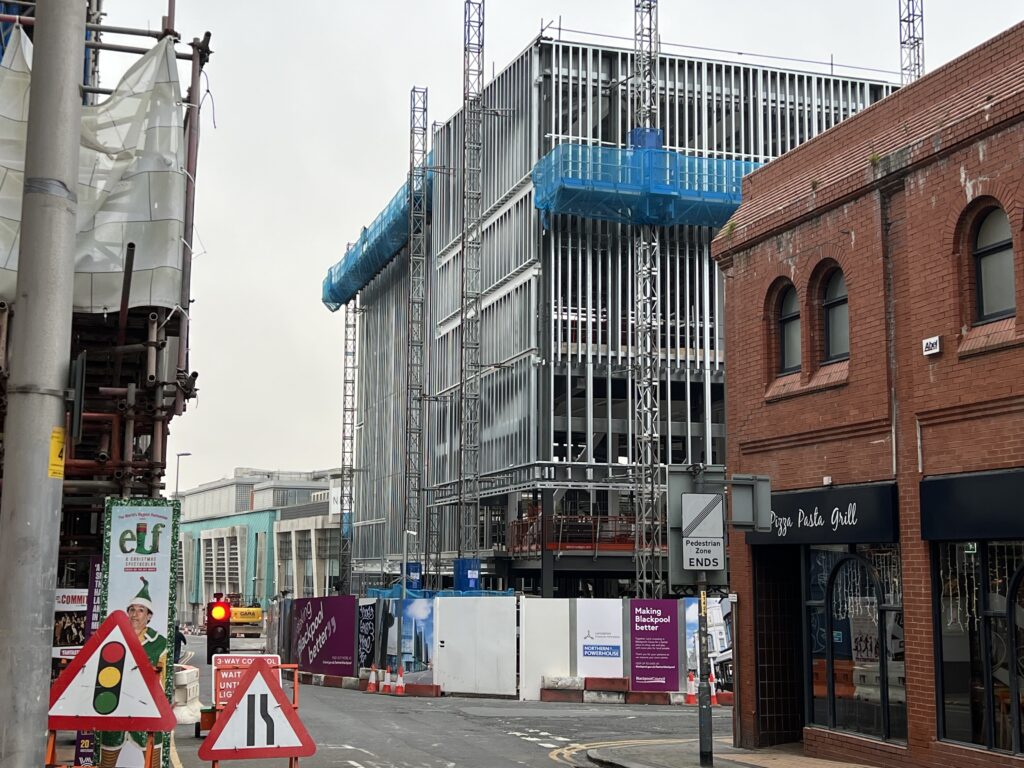 Looking along Coronation Street, Winter Gardens on the left