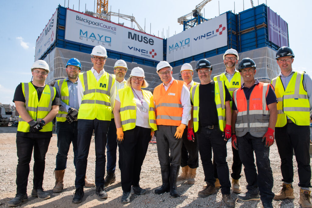 Partners from Blackpool Council Muse Vinci Construction and Mayo Civils at the new regional home for the civil service being constructed in Blackpool town centre 