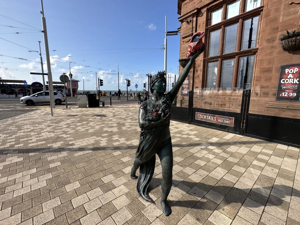 Call of the sea statue at Talbot Road opposite North Pier